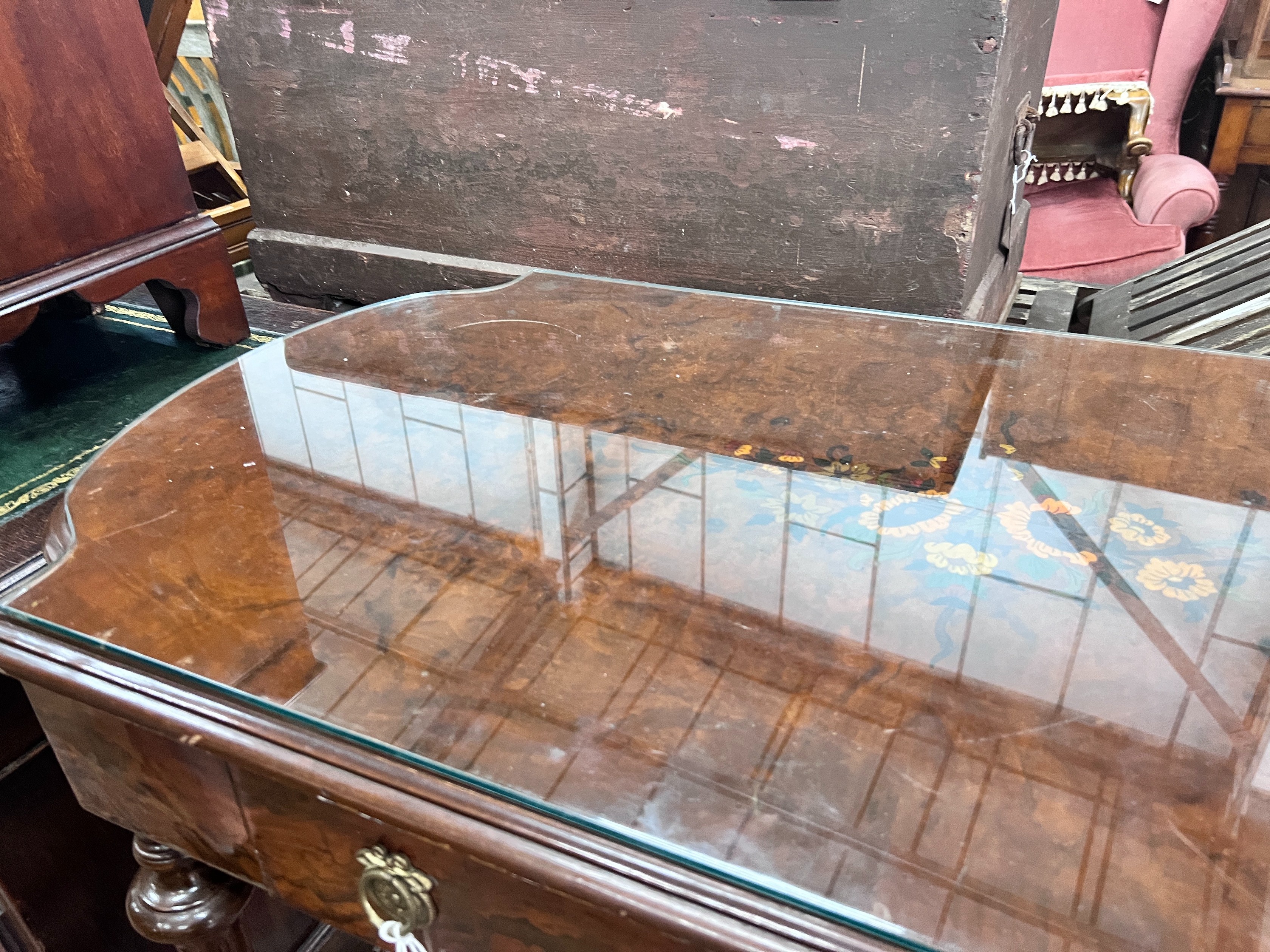 A continental marquetry inlaid walnut centre table, 117 x 59cm *Please note the sale commences at 9am.